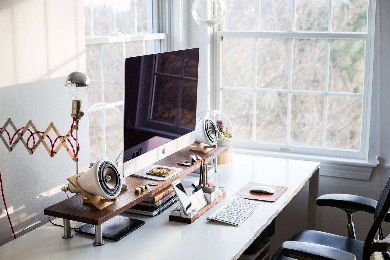 Home Desk set-up with a laptop and monitor in use